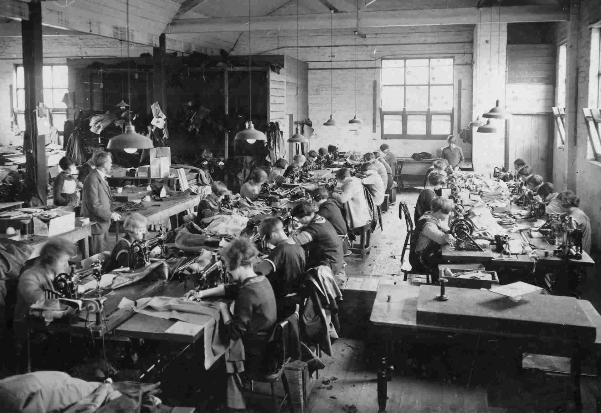 old textile factory women working sewing clothes old industry